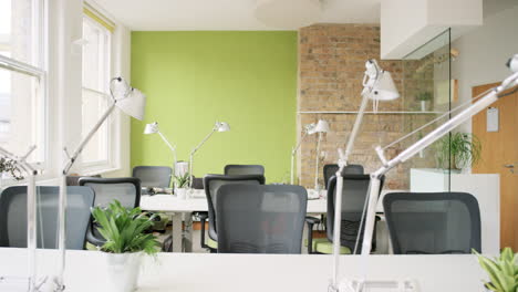 Empty-office-shared-workspace-bright-natural-light-in-modern-business-architecture-steadicam-movement