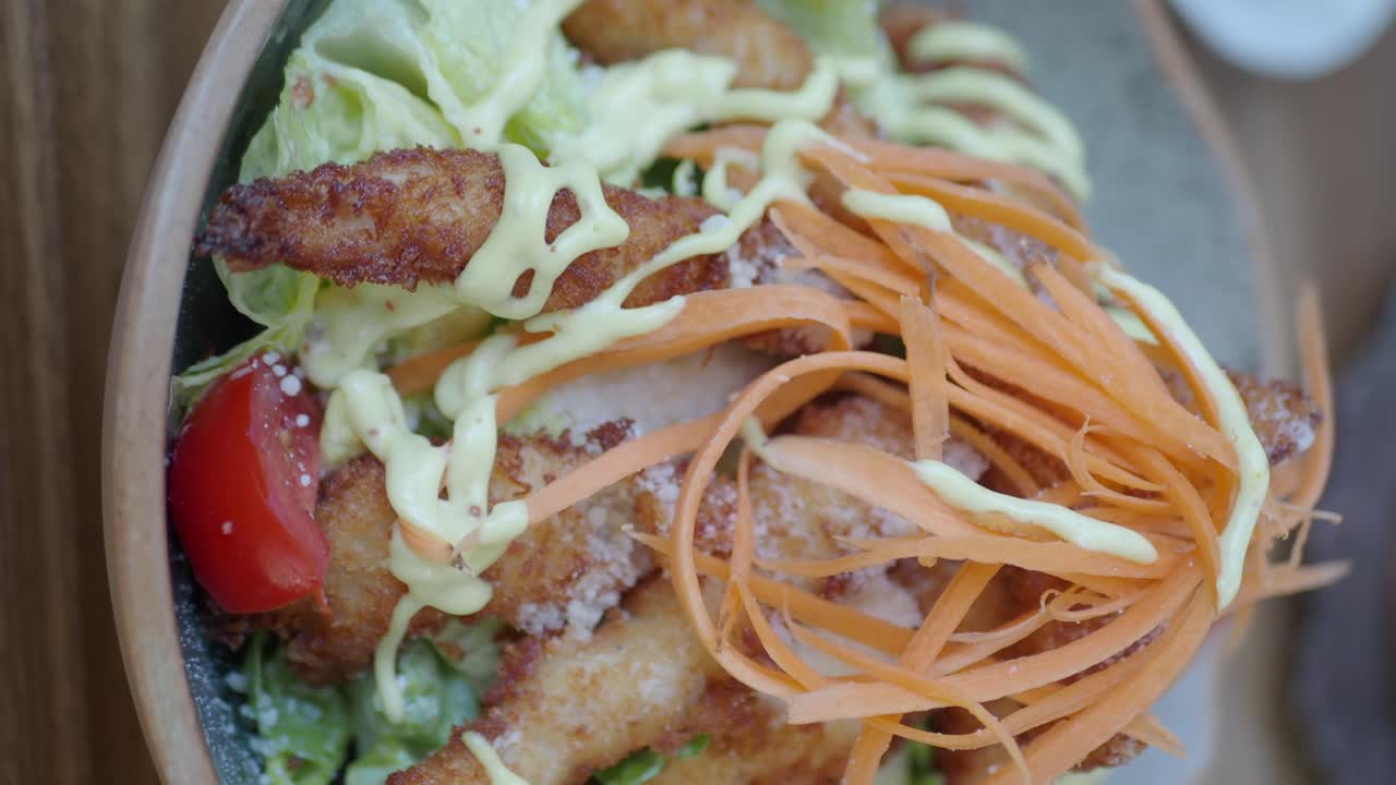 Chicken salad with carrots and tomatoes