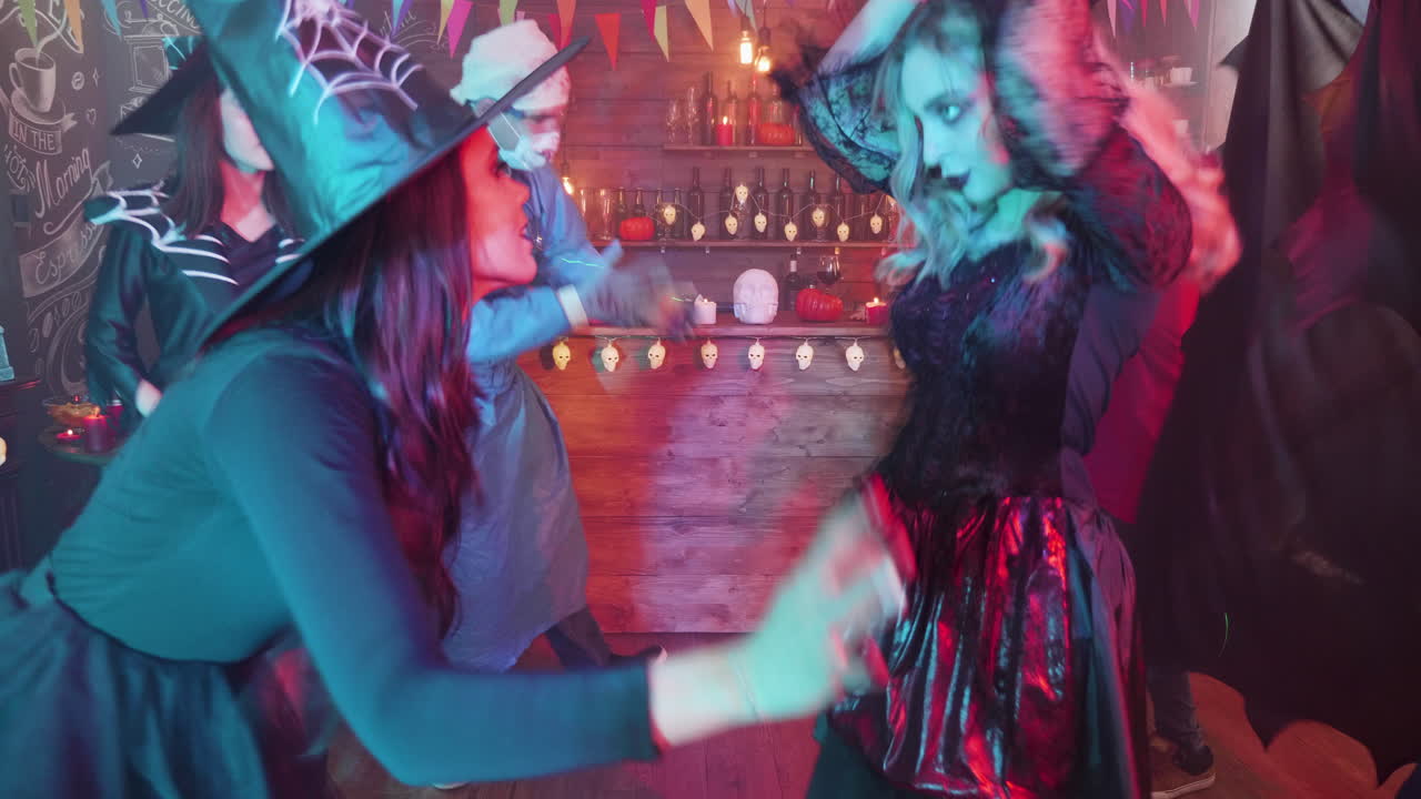 Halloween Party with People in Costumes