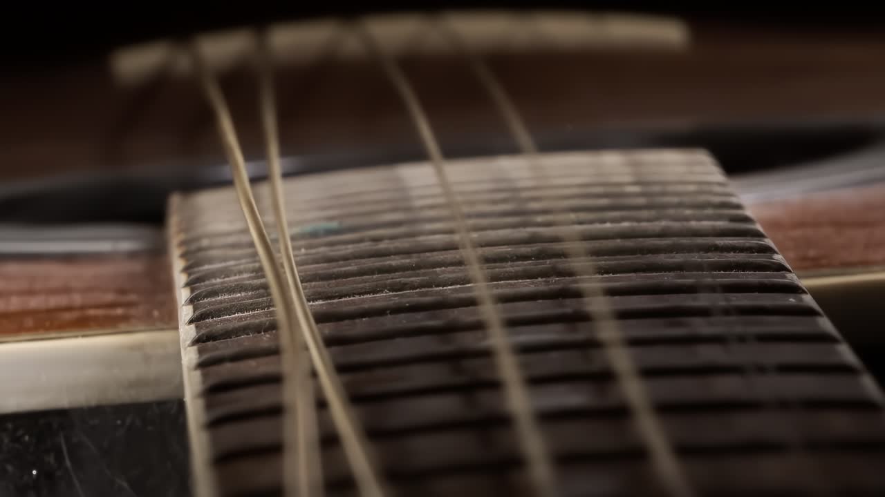 Acoustic guitar strings vibrating, Shot on super slow motion camera 1500 fps