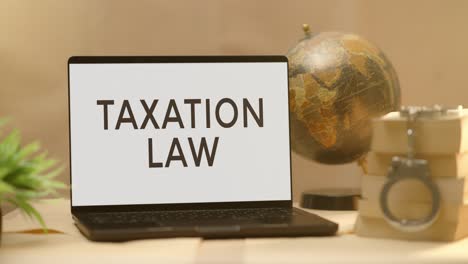 taxation law displayed in legal laptop screen