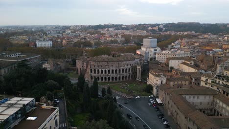 theatre of marcellus, ruins of temple of apollo palatinus - forward drone shot
