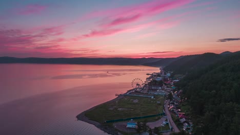 sunset over a lakeside town