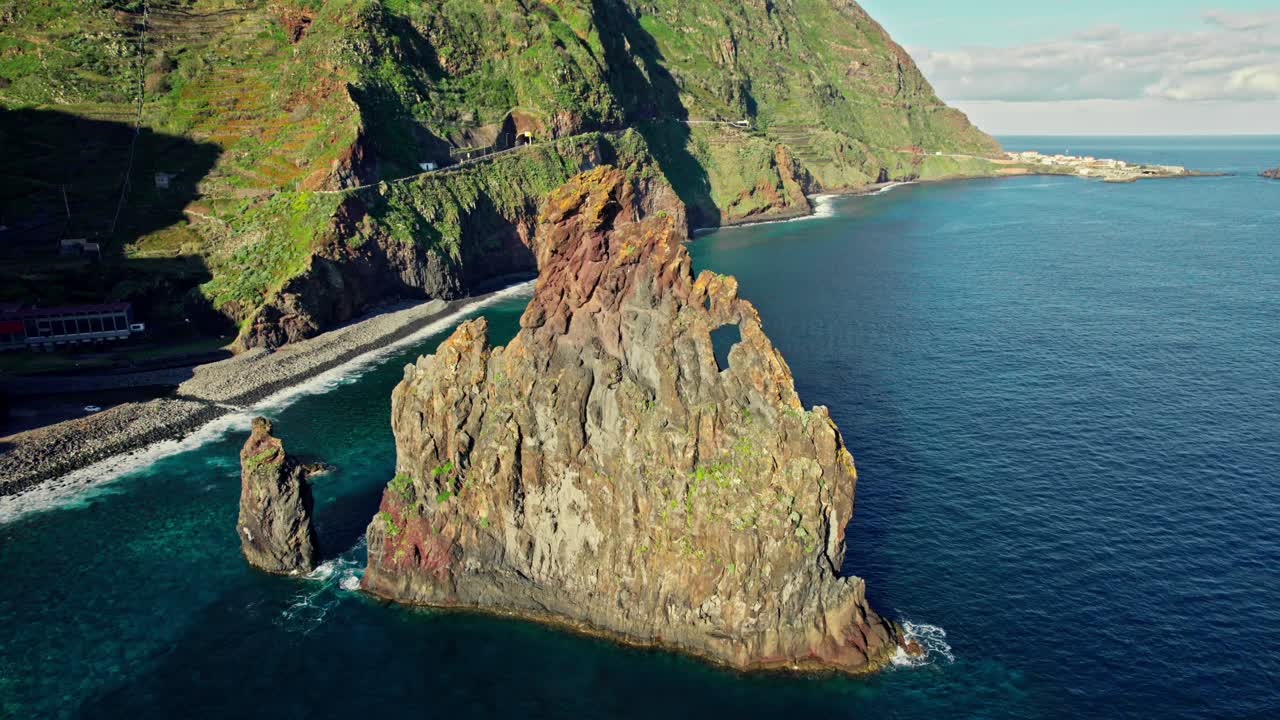 Dramatic Coastal Rock Formation in Volcanic Landscape