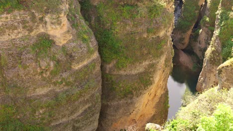 el tajo gorge with río guadalevín at the old town of ronda, spain