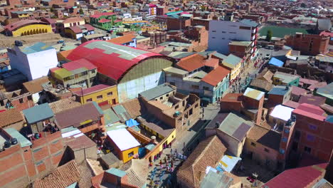 aerial view over a parade in the streets of historic potosi, bolivia