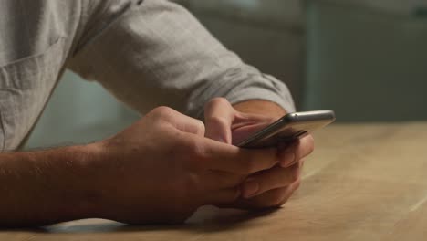 Caucasian-man-using-his-phone