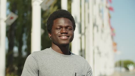 Close-up-of-happy-African-American-man-smiling-at-camera