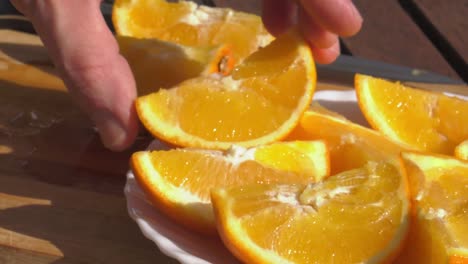 fresh juicy organic oranges placed onto a plate