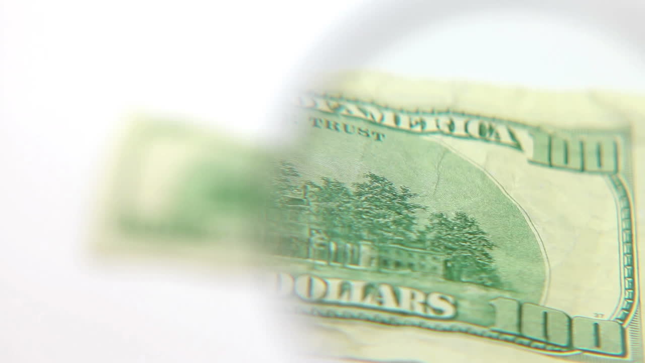 Magnifying Glass In Front Of A Banknote Free Stock Video Footage ...
