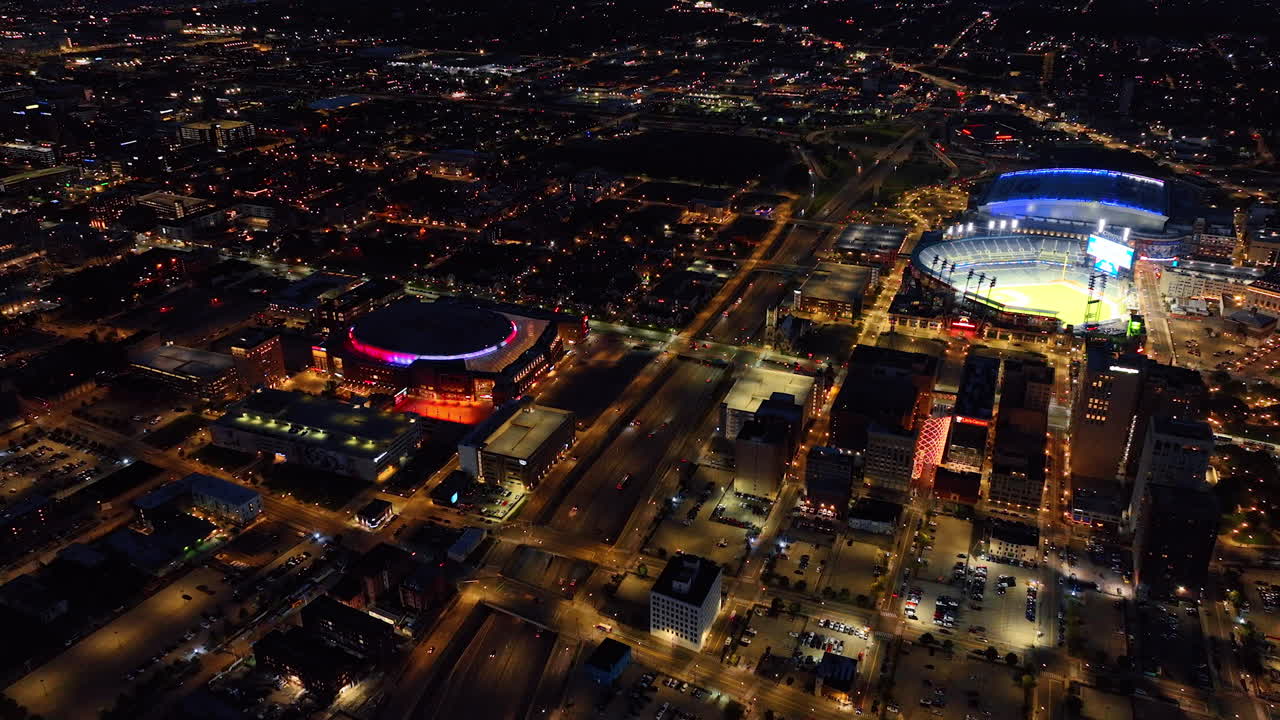 Detroit, USA, 28 July 2025: Panorama of night Detroit, Michigan, USA. Approaching luminous Comerica Stadium in the downtown of the city