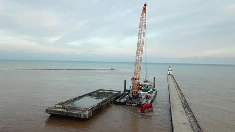 Dredging-operation-in-Kewaunee-Harbor-on-Lake-Michigan,-Kewaunee,-Wisconsin-19