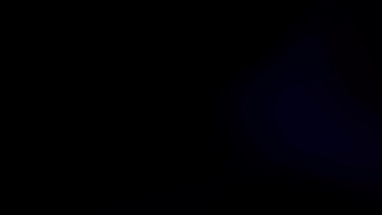 검은 바탕에 현실적인 다채로운 빛의 누출.