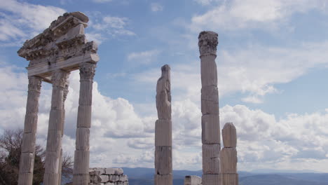 a row of pillars overlooking a landscape in pergamum