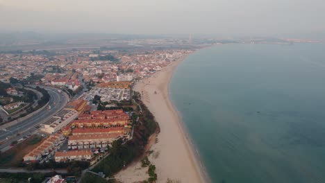 Drone-shot-moving-foward-of-the-El-Rinconcillo-Beach-in-the-province-of-Algeciras,-Spain