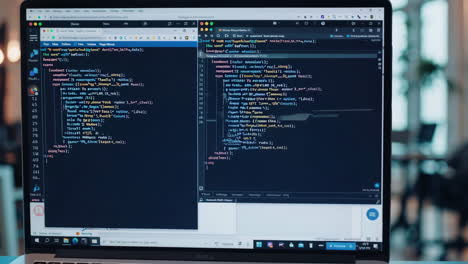 laptop screen showing coding