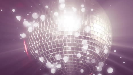 animation of glowing light spots moving on seamless loop over disco mirror ball