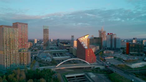 london westfield stratford modern shopping city development urban regeneration aerial view pull back sunset reveal