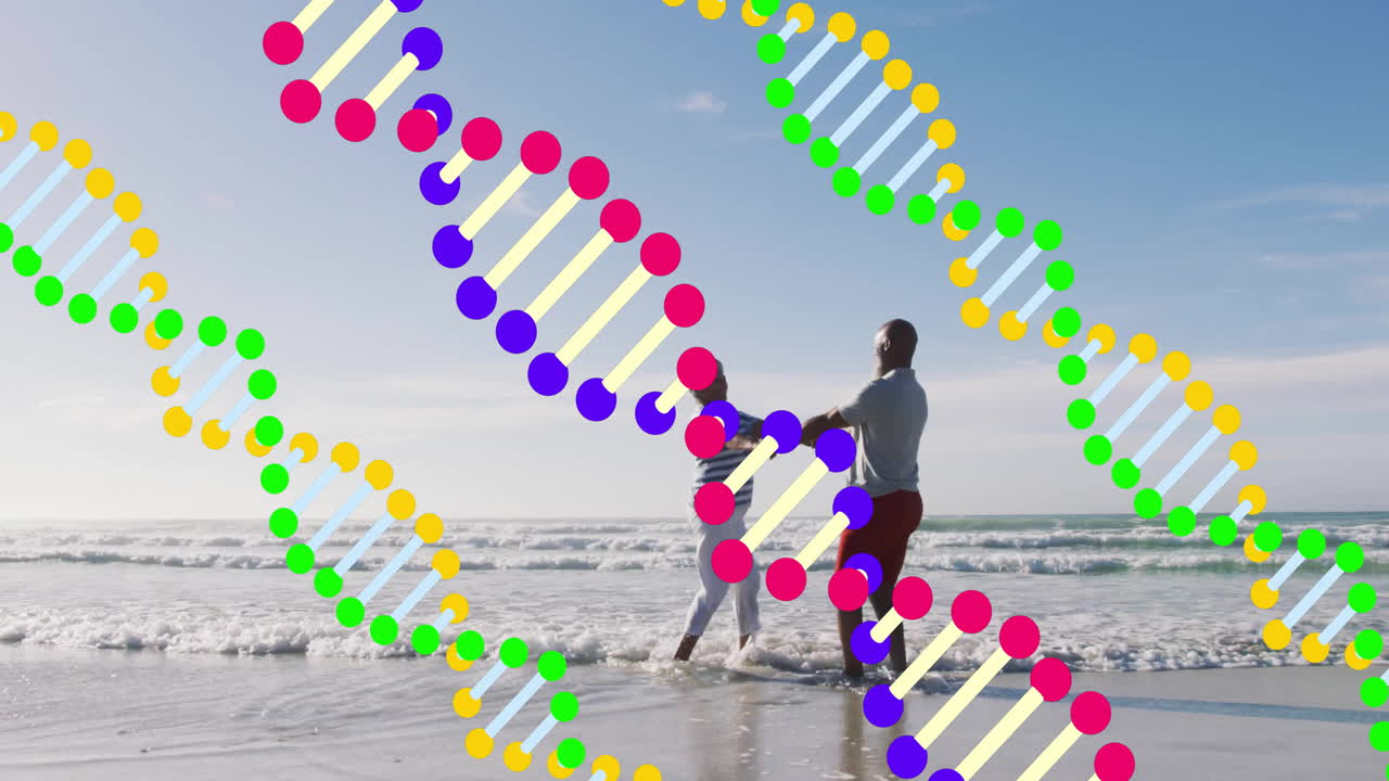 DNA strand animation over couple dancing on beach by ocean