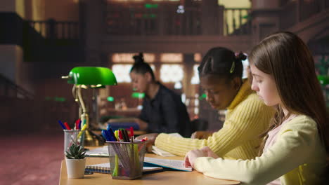 girls reading in library