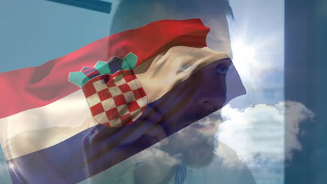 talking on phone, man with croatian flag animation in bright sunlight