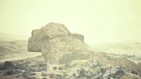 mysterious large rock formation on a desolate landscape during twilight hours