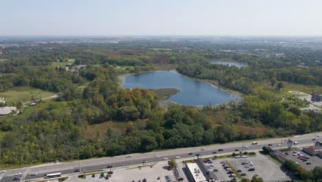 Aerial-view-of-a-pond-next-to-a-highway-in-London