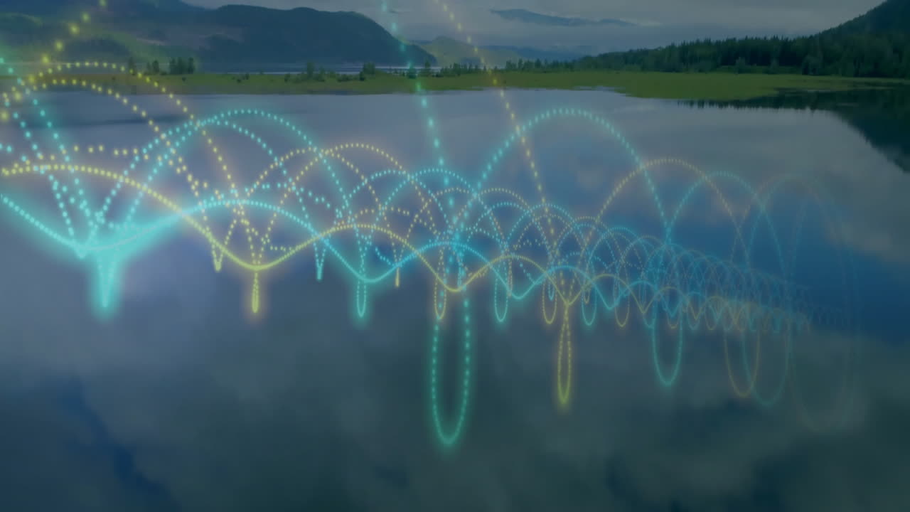 Animation of colorful wave patterns forming intricate designs over lake landscape