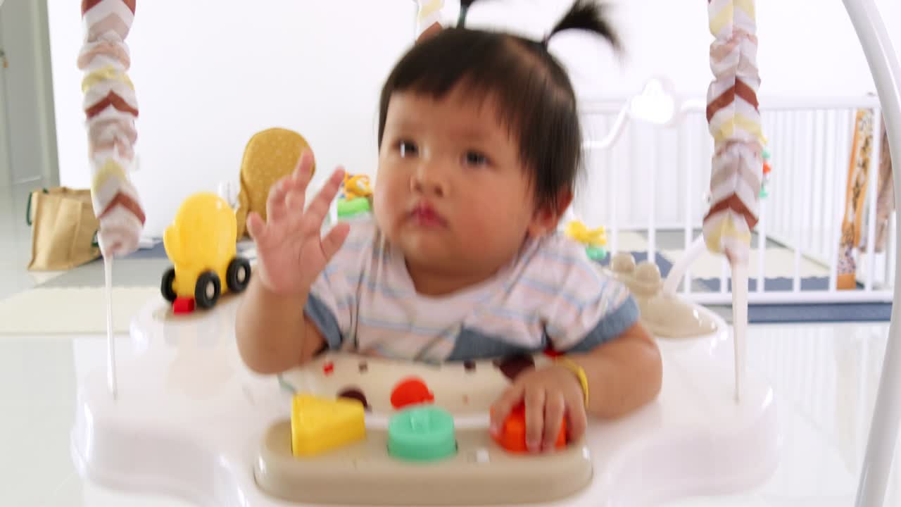 Explore essential baby care tips as a girl navigates nurturing moments at home.