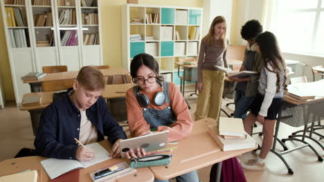 Students engaged in learning activities in a classroom