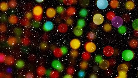 nieve cayendo con círculos de navidad de luz bokeh