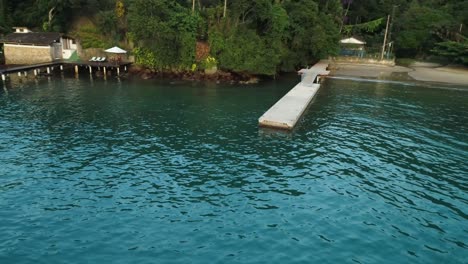 Ocean-hotel-in-the-coastal-beach,-drone-rotation-view-in-the-coastal-resort,-empty-coastal-beach-hotel-and-resort