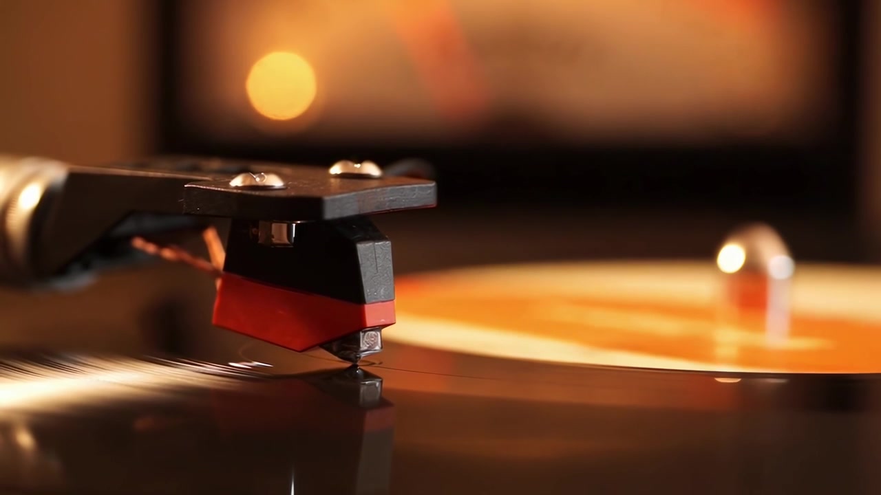 Close-up of a Turntable Needle Playing a Vinyl Record