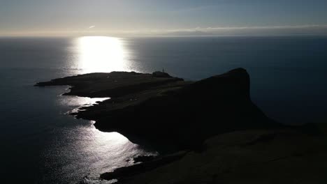 lighthouse on peninsula on sunny day at neist point isle of skye scotland