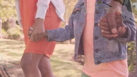animación de una familia afroamericana caminando en el parque sobre formas