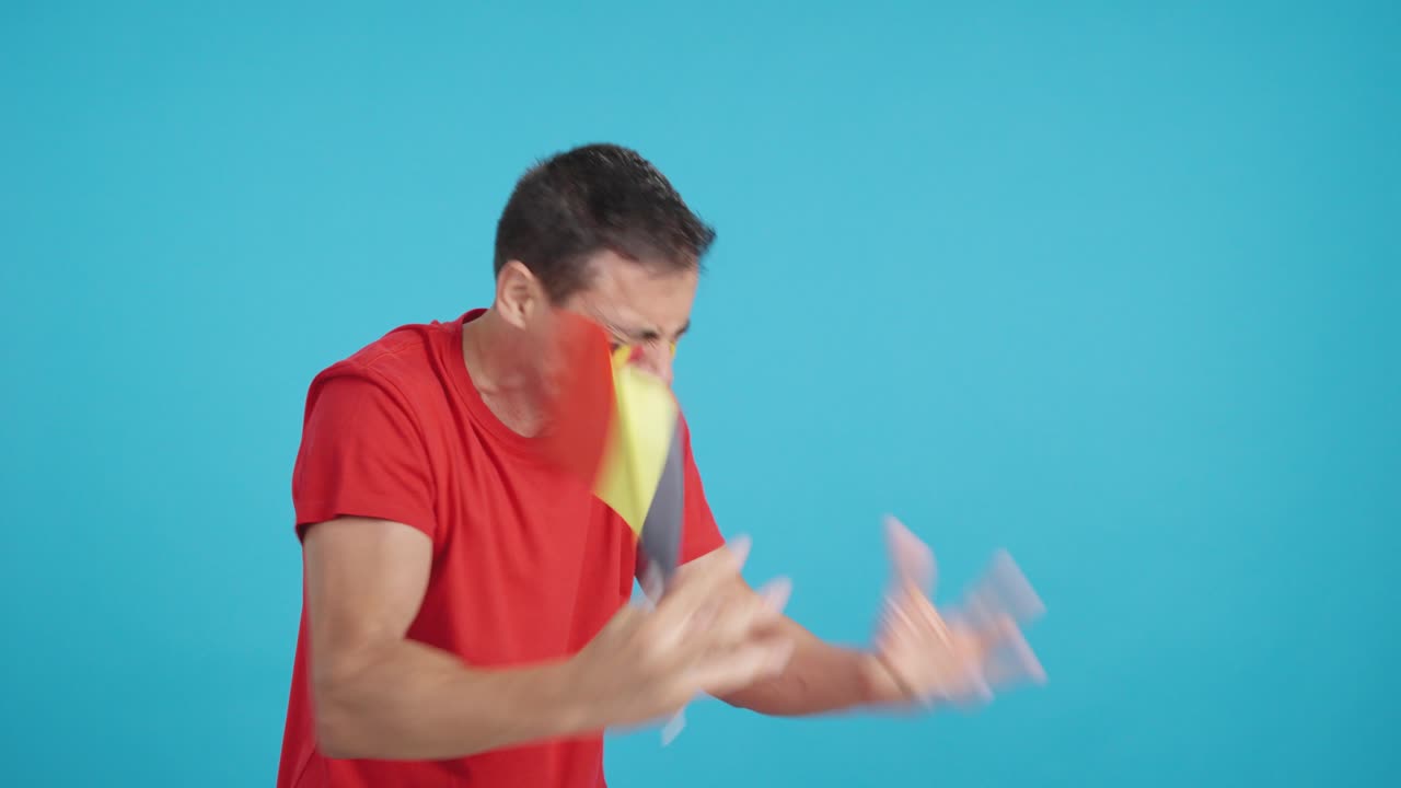 Man cheering for Belgium, angry with the decision of referee