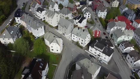 top down view over bergen laksevaag and damsgaard neighborhood - tilting up to reveal city with fjord and the whole neighborhood- norway