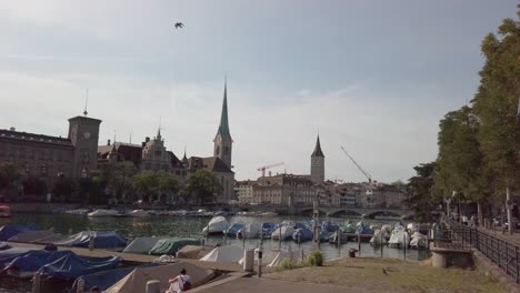 Zurich-and-Limmat-river-waterfront-aerial-view,-largest-city-in-Switzerland