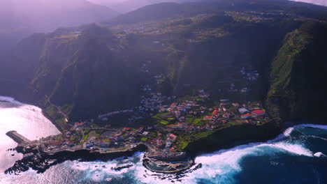 cinematic aerial view of poto moniz with beautiful mountain landscape and city in the valley