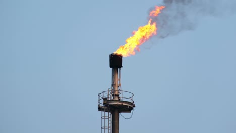 flame torch at oil field