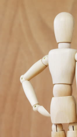 figurine standing with hands on hip