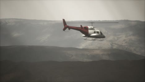 extreme-slow-motion-flying-helicopter-near-mountains-with-fog