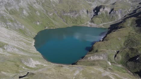 Dolomites-mountain-lake-filmed-with-drone,-sunny-day