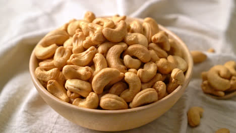 cashew nuts in wooden bowl