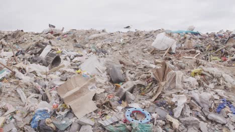 Rubbish-piled-on-a-landfill-full-of-trash-