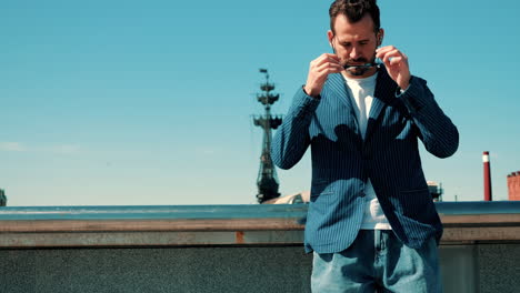 stylish man in a blue striped blazer