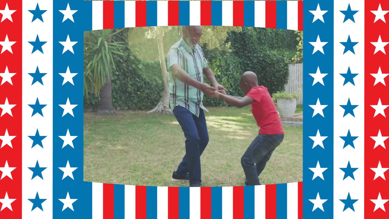 animación de la bandera de ee.uu. ondeando sobre el abuelo afroamericano sonriente y su nieto