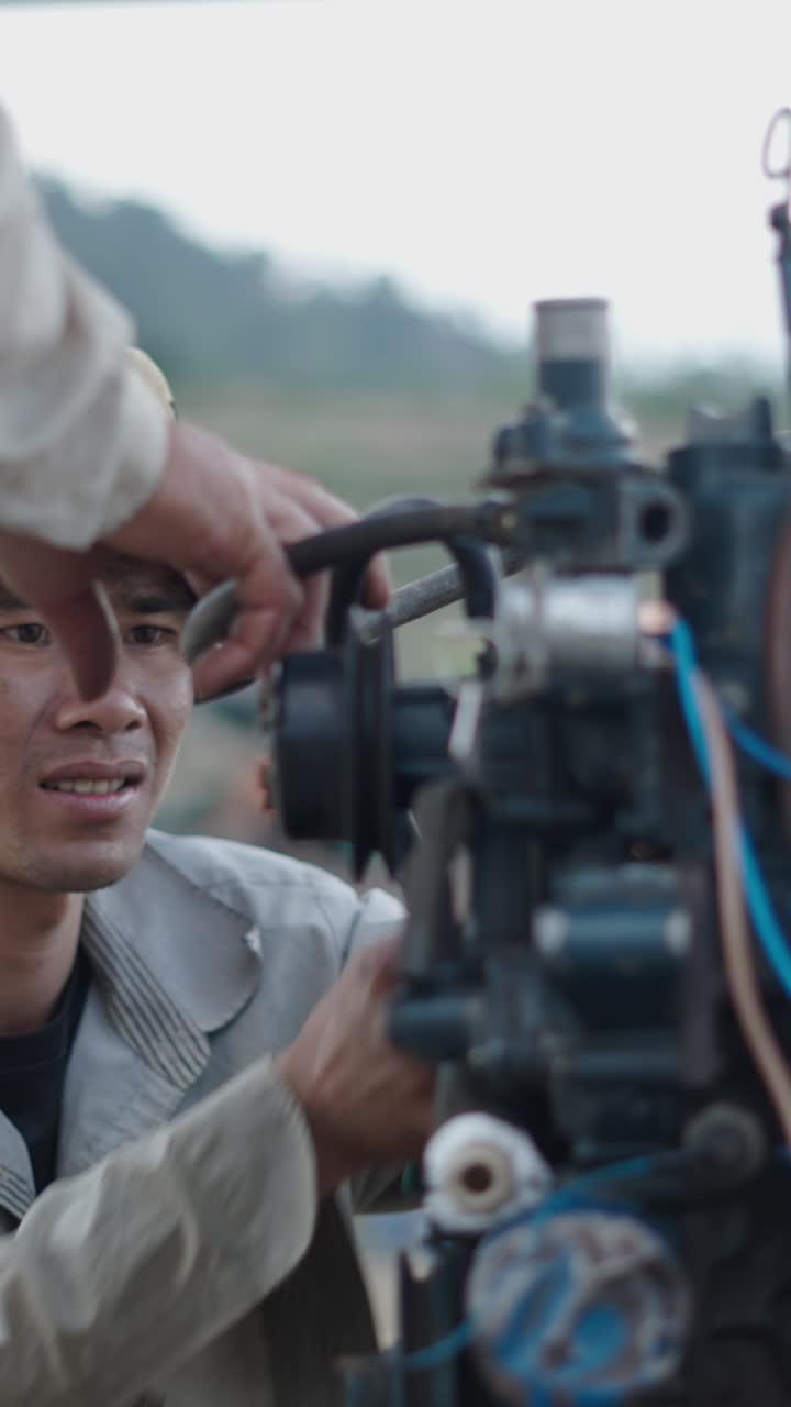 Man Repairing Engine