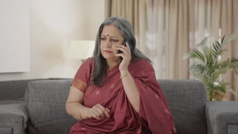 Angry-Indian-old-woman-shouting-on-call