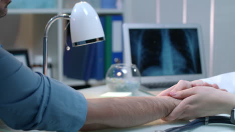 medical nurse measuring pulse at workplace. doctor check heartbeat speed